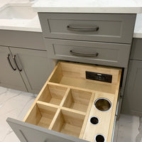 Thumbnail for Image of a bathroom drawer with three canister sizes and a Blade Docking Drawer
