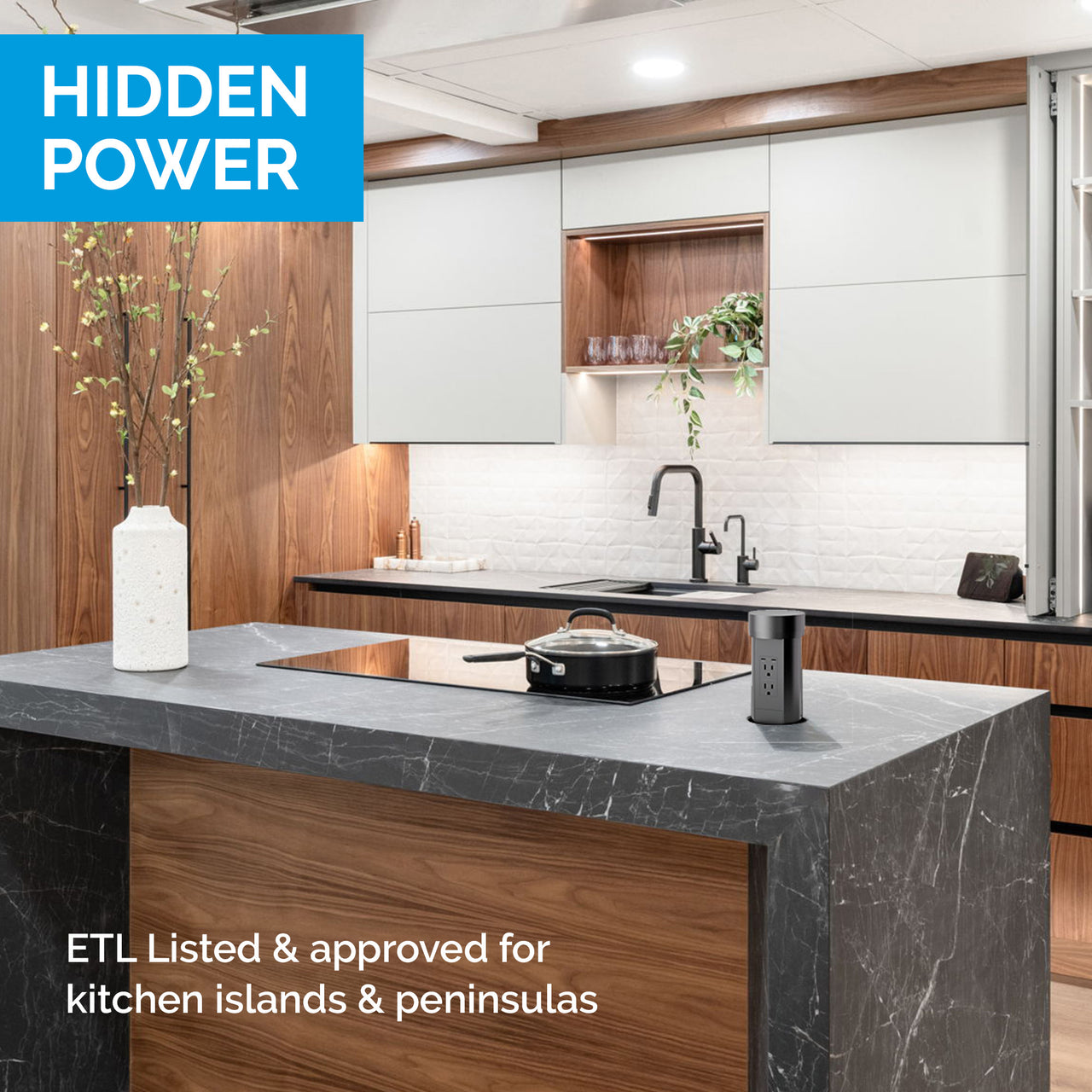 Hidden pop-up countertop outlet installed in a kitchen island for clean, modern power access