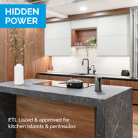 Thumbnail for Hidden pop-up countertop outlet installed in a kitchen island for clean, modern power access